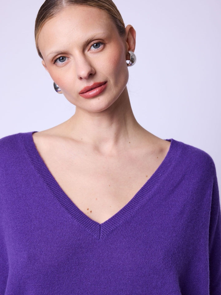 Pull mauve avec motif d'ailes Aurola